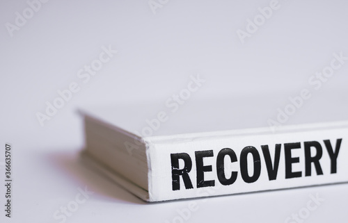 Self-help white book with the word 