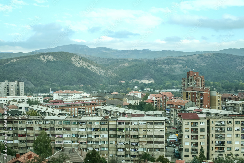 panorama of North Mitrovica, the serbian part of the town, with crumbling residential buildings, It is a symbol of the division between albanians and serbs in the city of Mitrovica