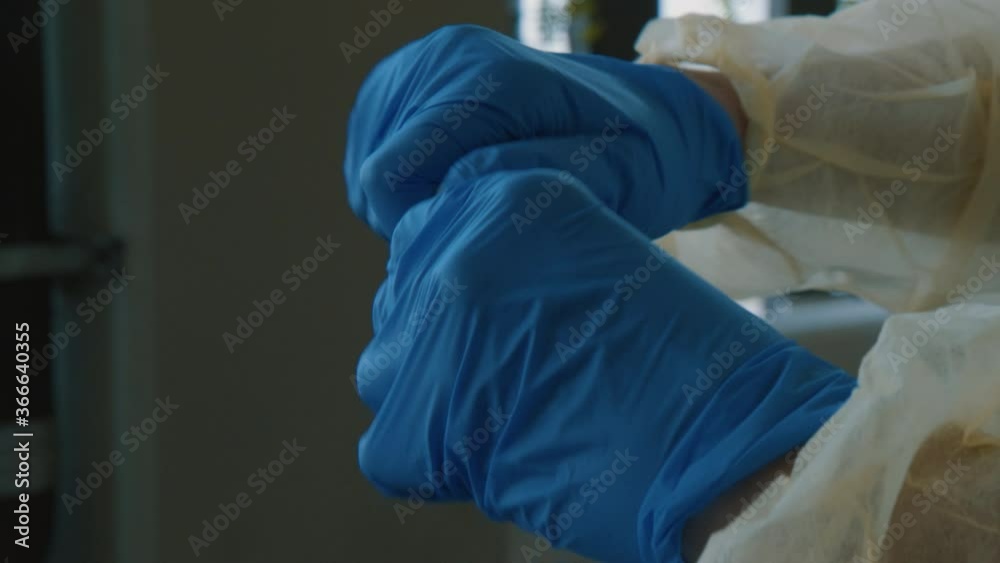 Coronavirus or COVID-19 Test, Nasal Swab inside tube being closed by Nurse Coronavirus or COVID-19 Test, Nasal Swab inside tube being closed by Nurse
