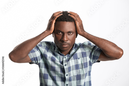 Sad African-American man on...