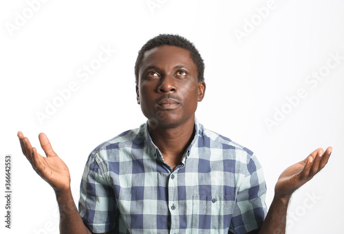 Sad African-American man on...