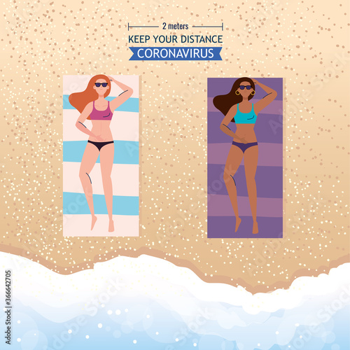 social distancing on the beach, women keep distance lying down tanning, new normal summer beach concept after coronavirus or covid 19