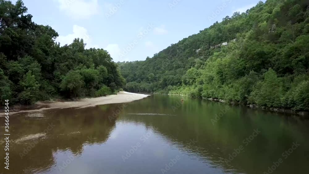 Flying over Buffalo National River revealing canoe Flying over Buffalo National River revealing canoe