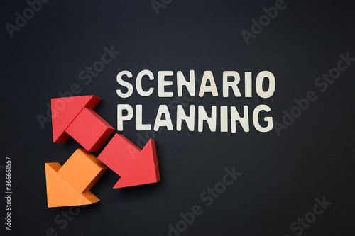 Arrows pointing at different directions with block letters text on scenario planning on the black background  © NorSham