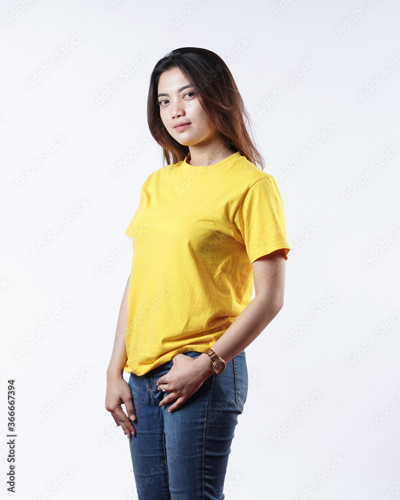 Front view yellow t-shirt Closeup on female body, woman girl in empty yellow t-shirt isolated on white background. Design woman t-shirt template and mockup for print. Front view yellow t-shirt Closeup on female body, woman girl in empty yellow t-shirt isolated on white background. Design woman t-shirt template and mockup for print.