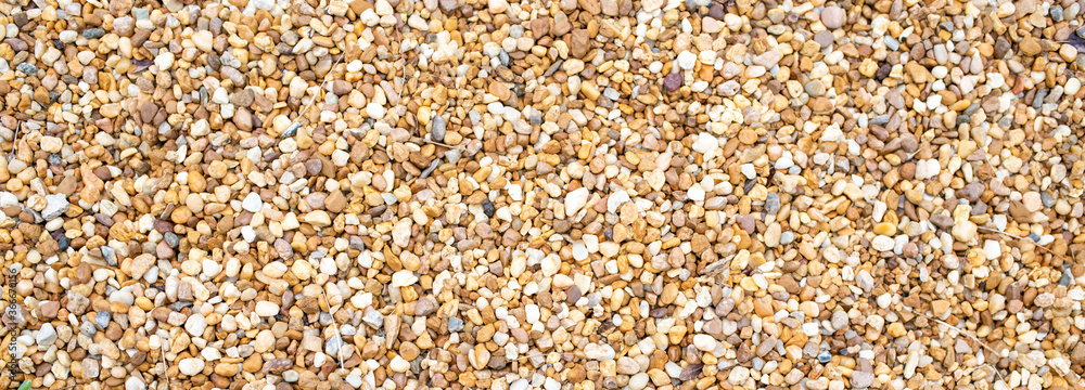 Gravel background pea rock texture banner Gravel background pea rock texture banner
