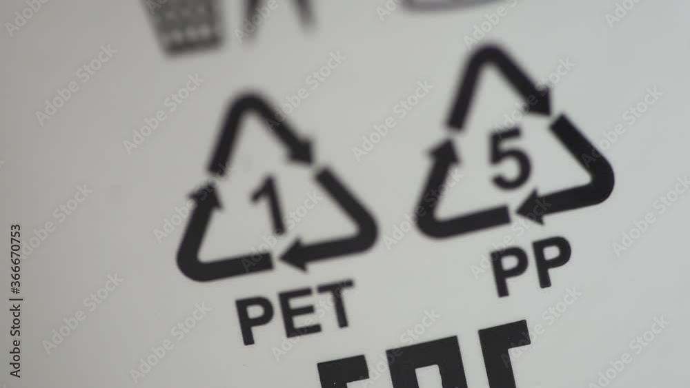 Closeup view of signs and symbols of recycling on white background packaging spbd. Eco labeling pet and PP is depicted on packages of products made of polypropylene. Concept: recycling, ecology