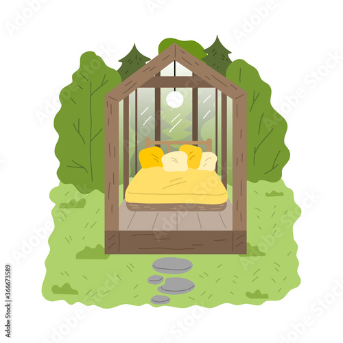 Wooden glamping house with transparent walls and bedroom surrounded by forest