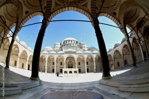 The arcade and atrium of the S  leymaniye Mosque in Istanbul  Turkey.