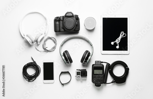 Different modern devices on white background photo