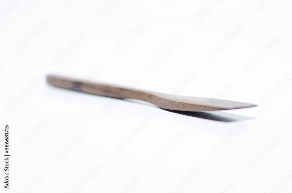 unique tradtional wooden stir on isolated white background unique tradtional wooden stir on isolated white background