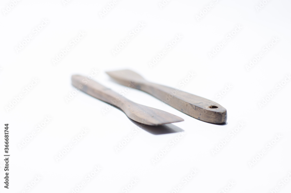 unique two tradtional wooden stir on isolated white background unique two tradtional wooden stir on isolated white background