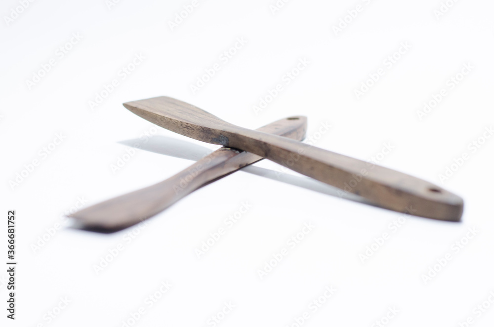 unique two tradtional wooden stir on isolated white background unique two tradtional wooden stir on isolated white background