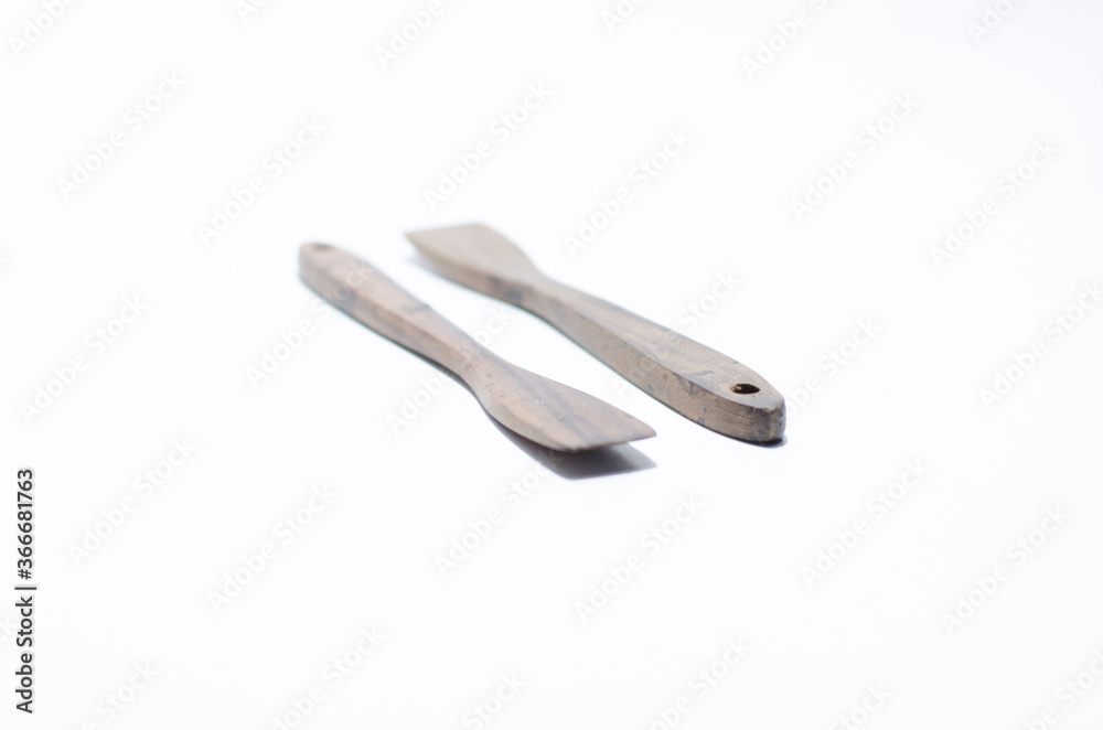 unique two tradtional wooden stir on isolated white background unique two tradtional wooden stir on isolated white background