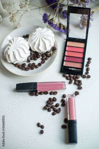 make up brushes and powder lipsstick  photo