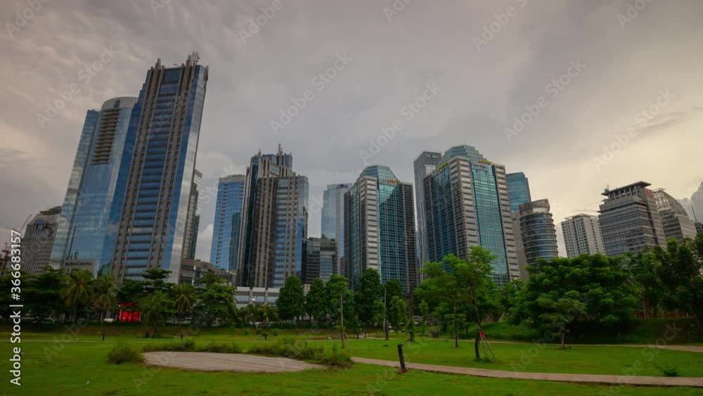 cloudy day jakarta city downtown famous park timelapse panorama 4k indonesia cloudy day jakarta city downtown famous park timelapse panorama 4k indonesia