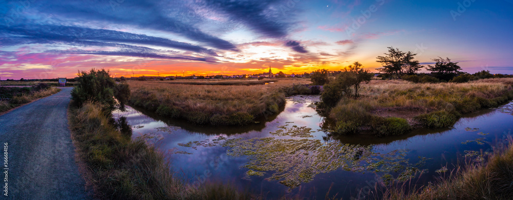 Panoramic view of the salt marshland at sunrise, Olonne area, Vendee, France Panoramic view of the salt marshland at sunrise, Olonne area, Vendee, France