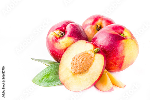 Raw peaches isolated on white