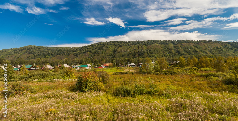 Fototapeta premium Summer landscape with hills, sky, forest