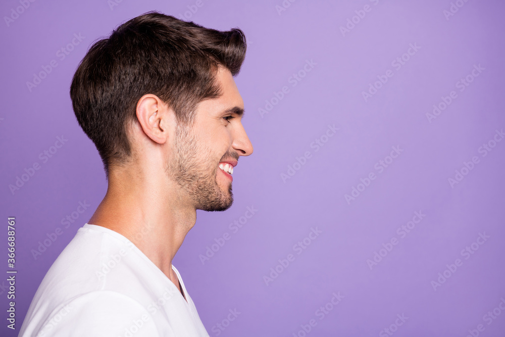 Fototapeta premium Close-up profile side view portrait of his he nice attractive content cheerful cheery guy modern haircut look isolated over bright vivid shine vibrant lilac violet purple color background