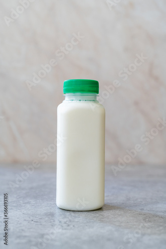Take Away Authentic Indian Cold Drink Made up of Curd and Milk called Lassie / Lassi Kefir in Plastic Bottle