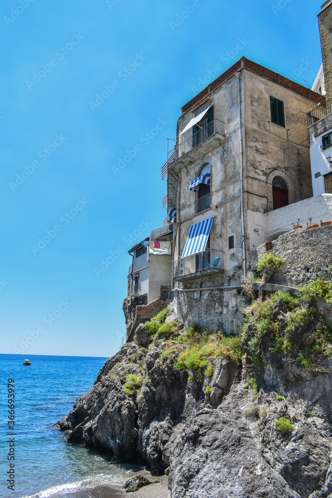 Minori, italy,
buildings and mountains of a small town in Slerno facing the sea.