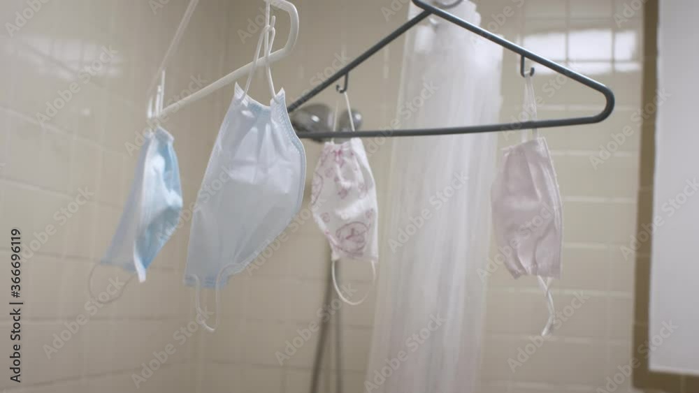 Hang drying protective face masks during the early stages of the Coronavirus pandemic when there was a shortage of masks and washing and re-using them was encouraged. 