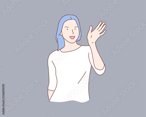 teenage girl raises her hand and saying hello