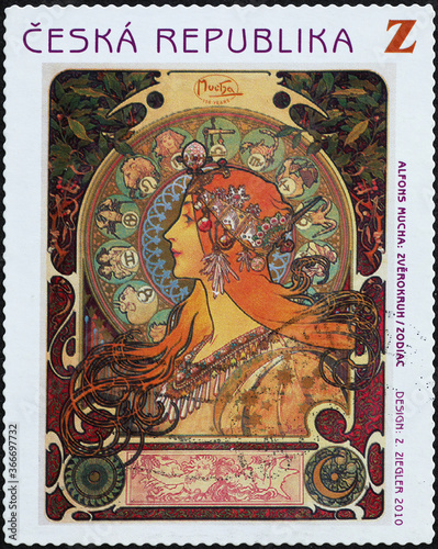 Illustration of Zodiac by Alfonse Mucha on postage stamp