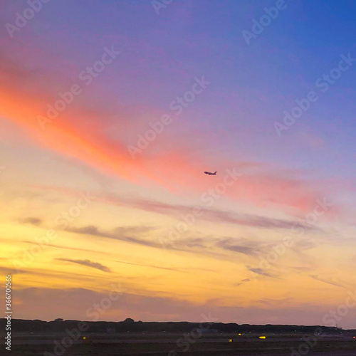 An airplane on the sunset _                      