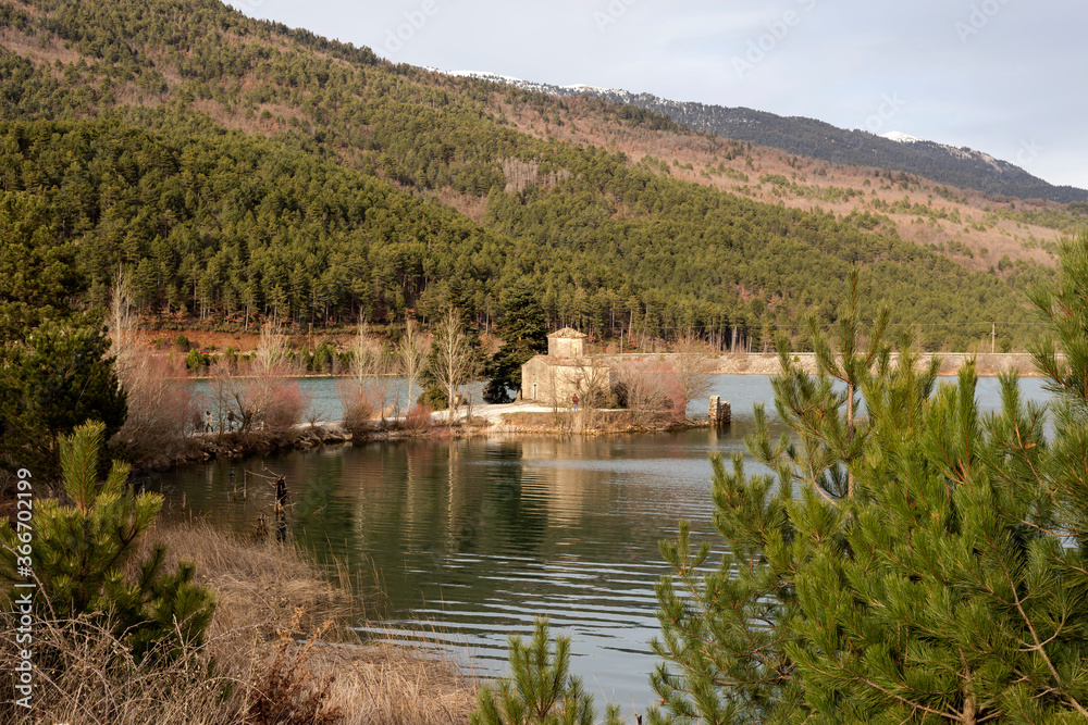 Church on the lake Pineiou in winter (Greece, Peloponnese)
