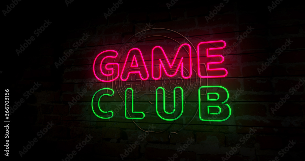 Game club with gamer symbol neon on brick wall Game club with gamer symbol neon on brick wall