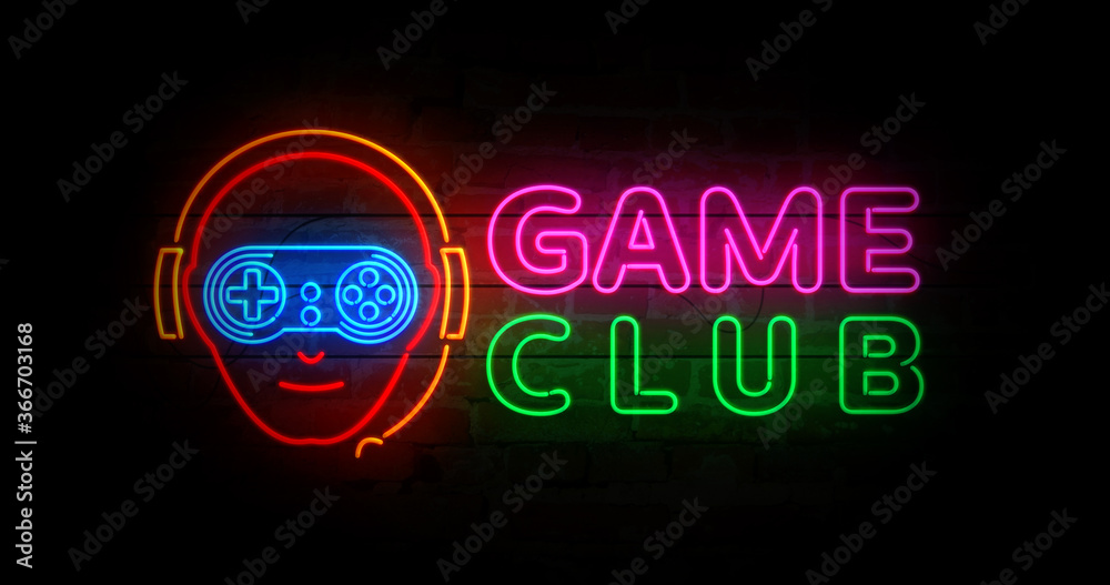 Game club with gamer symbol neon on brick wall