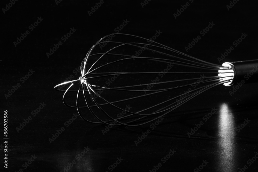 Kitchen tool close-up on black background Kitchen tool close-up on black background