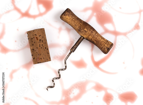 Bild auf Leinwand Corkscrew and and cork with wine stains isolated on white