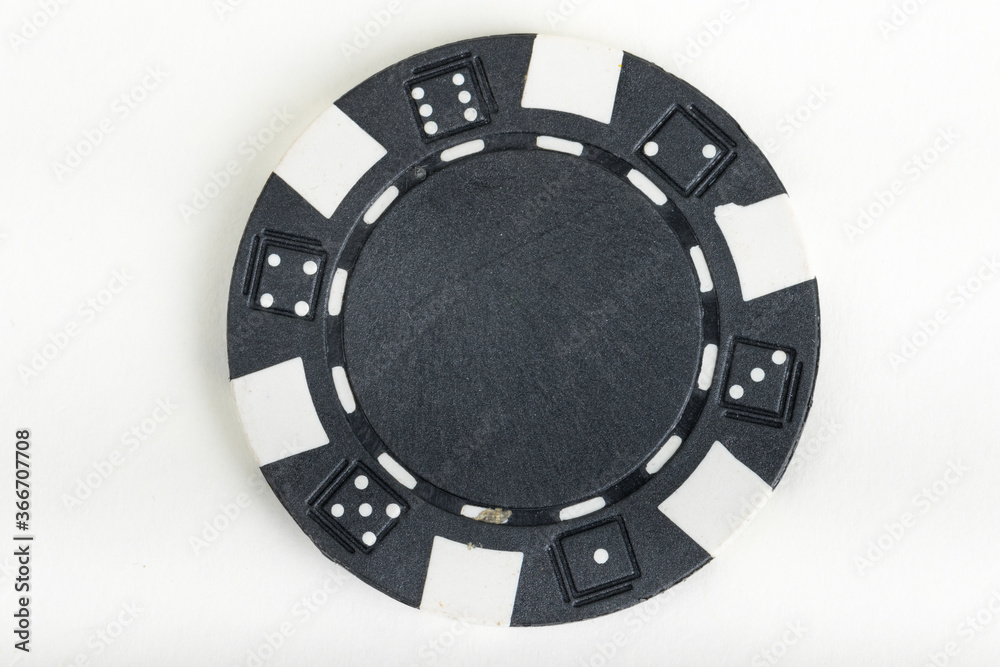 Black playing poker chip isolated on white background. Black playing poker chip isolated on white background.