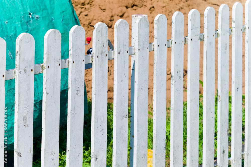 Ground works behind a fence Ground works behind a fence