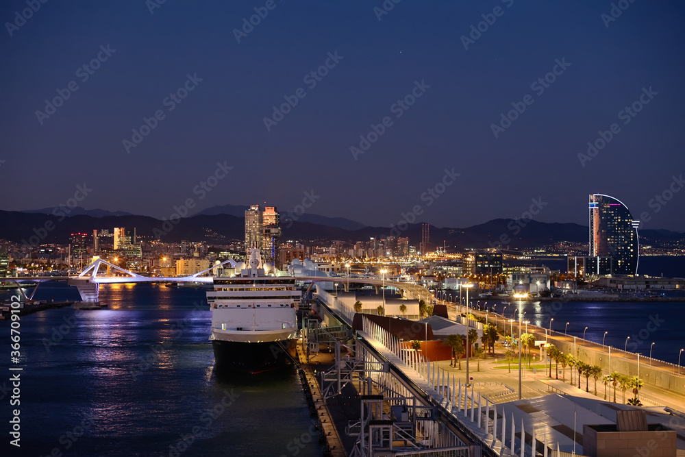 liner in the passenger port of barcelona at night