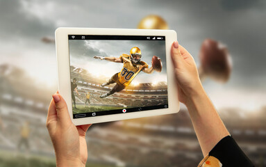 Close up hands holding tablet viewing sport, american football online streaming of championship. New rules during coronavirus outbreak and countries lockdown. Concept of sport, competition