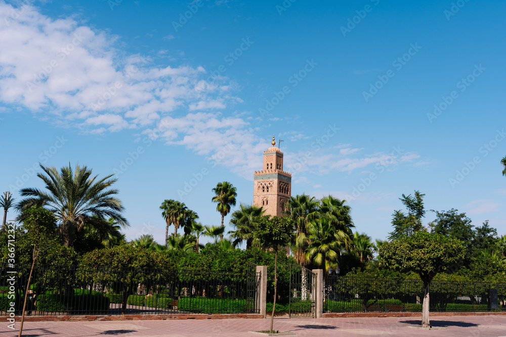 Square and garden with the tower of the Moulay el Yazid Mosque mosque in the background
