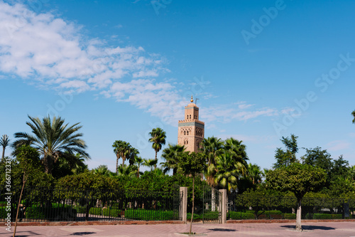Square and garden with the tower of the Moulay el Yazid Mosque mosque in the background