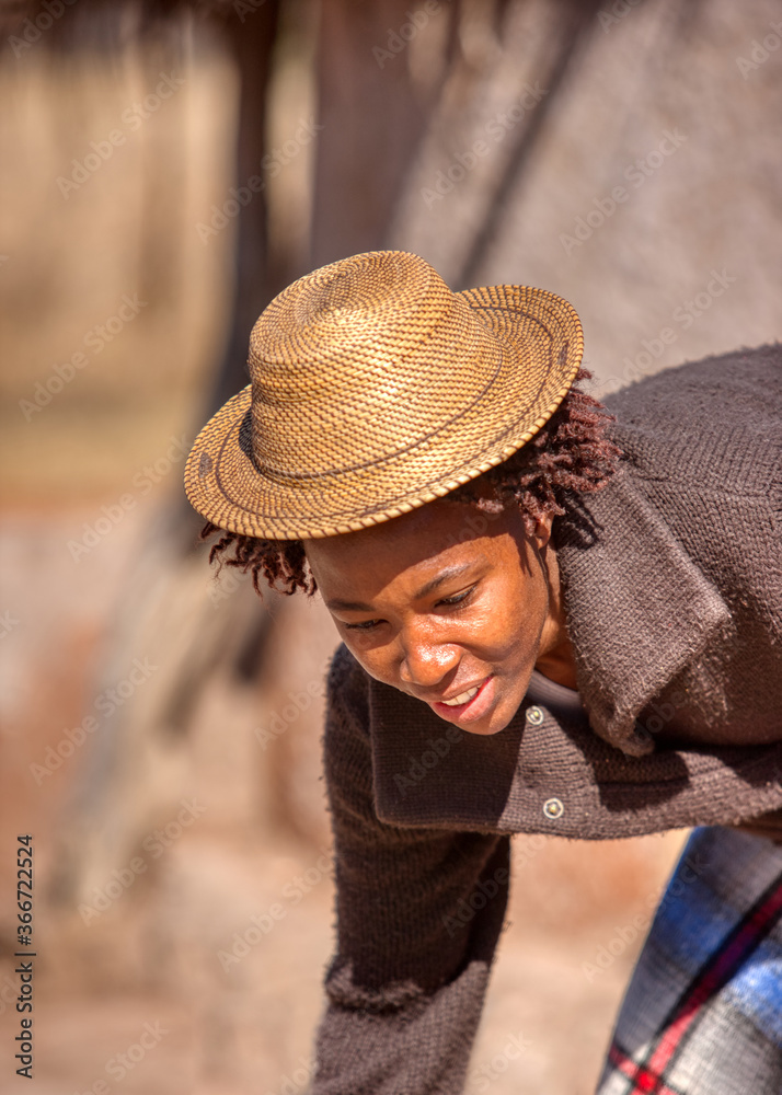 african woman with hat
