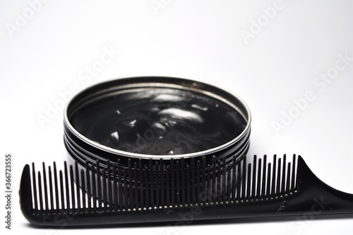 Photos Hair pomade or waxe and comb isolated on white background
