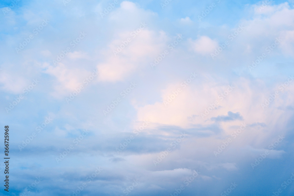 Abstract background blue clouds. Smooth cloudscape of bright colours
