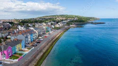 Aerial view on coast in Whitehead, Northern Ireland. Drone photo of town and water of Irish Sea 