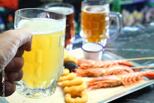 Beer pub. Langoustines and beer. Beer and seafood snacks. Langoustines, beer, squid rings. 