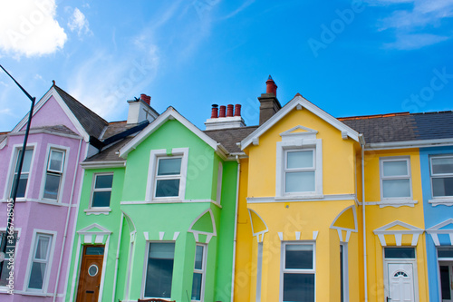 Colorful houses red, green, yellow and blue in row in Whitehead, Northern Ireland