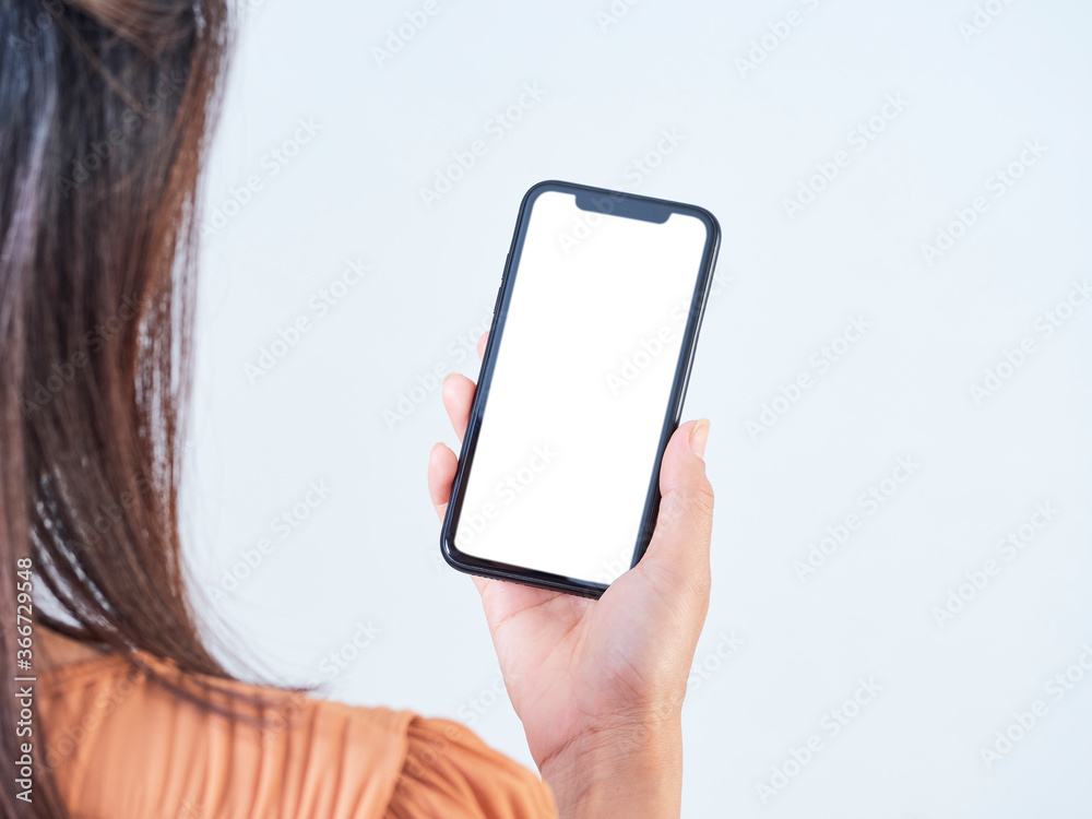 Woman with smartphone a blank screen