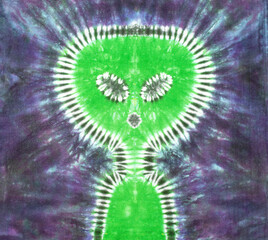 Alien tie dye pattern handy on cotton fabric texture background.