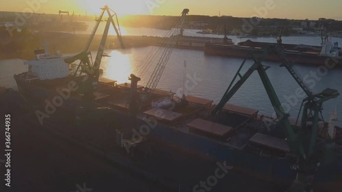 ships being loaded with coal for export at Kooragang Island Newcastle Australia. Newcastle is one of the biggest coal export port in the world (aerial photography) photo